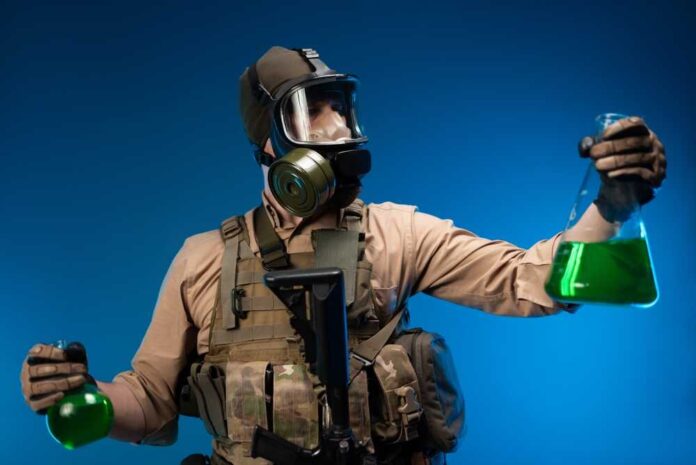 A,Man,In,Military,Clothes,And,A,Gas,Mask,With
