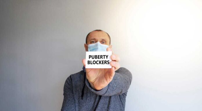 Puberty,Blockers,Symbol.,White,Card,With,Words,'puberty,Blockers'.,A