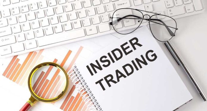 Insider,Trading,Text,Written,On,Notebook,With,Keyboard,,Chart,and,Glasses