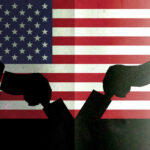 Election Integrity or Voter Suppression? The Debate Rages Silhouetted handshake over United States flag background