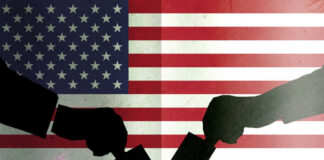 Silhouetted handshake over United States flag background