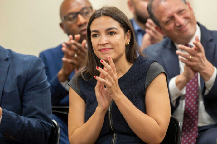 alexandria-ocasio-cortez-claps2467431681jpg AOC