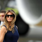 Melania Trump STUNS Diplomats With Historic Power Grab I dont know who this is sunglasses blue dress