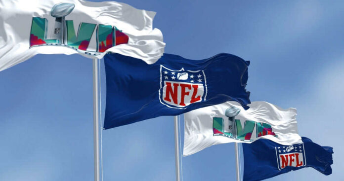 Four flags with NFL and Super Bowl LVII logos.