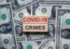 COVID-19 CRIMES on blocks, surrounded by dollar bills.