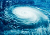Hurricane swirling over the ocean seen from above