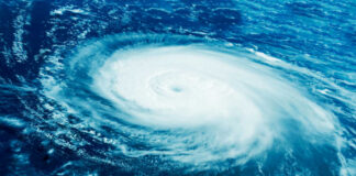 Hurricane swirling over the ocean seen from above