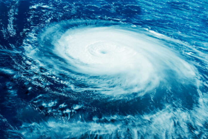 Hurricane swirling over the ocean seen from above