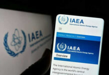 IAEA Shatters “Imminent Iran Nuke” Myth IAEA website displayed on smartphone screen.