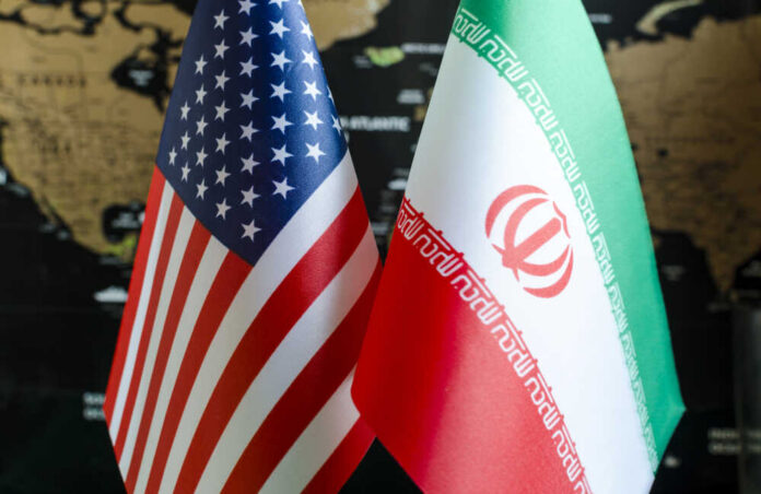 Flags of the United States and Iran displayed together