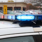Shocking Pipe Bomb Discovery Near D.C. Close-up of a police car's emergency lights in a parking lot