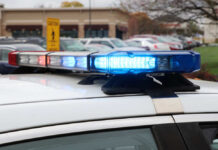 Shocking Pipe Bomb Discovery Near D.C. Close-up of a police car's emergency lights in a parking lot