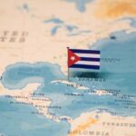 CODEPINK Defies U.S. Sanctions with Cuba Aid Map of the Caribbean with a small Cuban flag pinned on Cuba