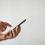 Person using a smartphone with one hand