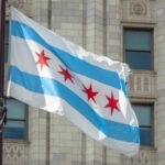 Chicago flag waving in front of a building