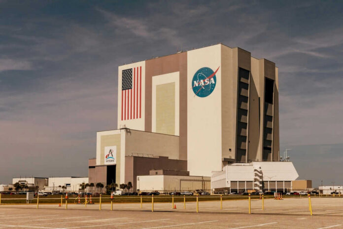 NASAs Vehicle Assembly Building with Artemis sign.