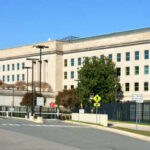 Exterior view of the Pentagon building with clear blue sky