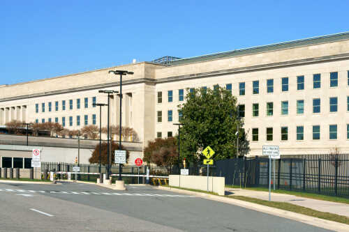 Exterior view of the Pentagon building with clear blue sky