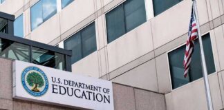 Exterior view of the U.S. Department of Education building with an American flag