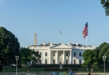 The White House with the Washington Monument in the background