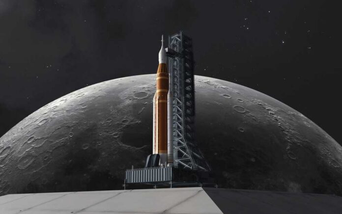 shutterstock_2735416611.jpg A rocket on a launch pad with the moon in the background
