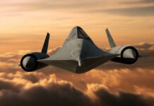 A stealth aircraft flying above clouds during sunset