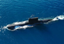 Submarine sailing on the ocean surface