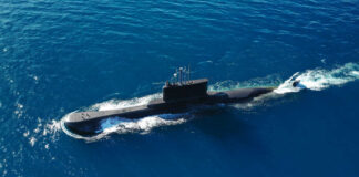 Submarine sailing on the ocean surface