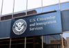 USCIS Halts Asylum Processing, Approval Rates Plummet US Citizenship and Immigration Services building sign