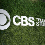 Paramount’s Secret Move Against Editor Sparks Chaos CBS Television Studios logo on green hedge backdrop