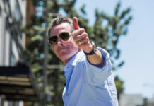 FREE Diapers for All While California BLEEDS Cash Man giving a thumbs up while wearing sunglasses