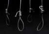 Dawn Hanging Shocks Iran’s Space Program Four nooses hanging against a dark background