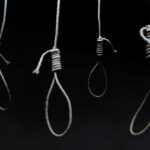 Dawn Hanging Shocks Iran’s Space Program Four nooses hanging against a dark background