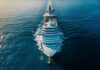 Aerial view of a large cruise ship sailing on calm ocean waters