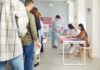 Voter-Approved Map AXED By Top Court People waiting in line at a polling station to cast their votes