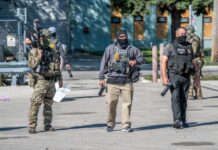 Law enforcement officers in tactical gear during an operation