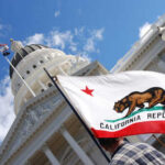 Arcadia Mayor Pleads Guilty to Felony Charges California state flag held up in front of a government building under a blue sky