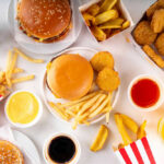 Fast food with burgers fries nuggets and drinks