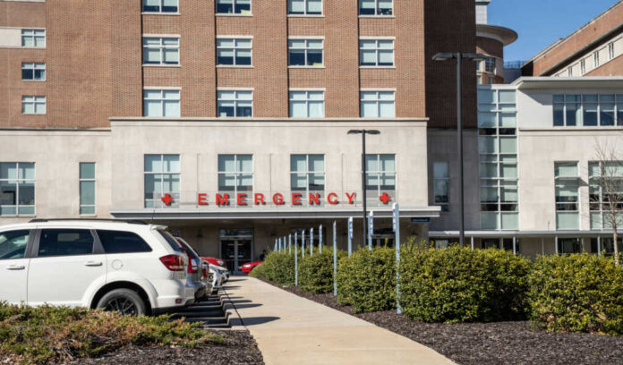 Hospital emergency entrance with parked cars