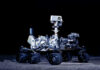 Robot Kill Zone Upends War Mars rover with six wheels and camera mast on dark background