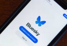 Mobile phone displaying the Bluesky app login screen