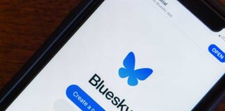 Mobile phone displaying the Bluesky app login screen