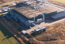 Aerial view of a large industrial facility with various structures and equipment