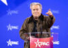 Inside War Room: Megaphone or Minefield? Person speaking at CPAC conference blue background
