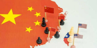 Map with chess pieces and flags on China
