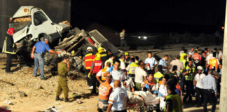 Emergency responders at the scene of a vehicle crash.