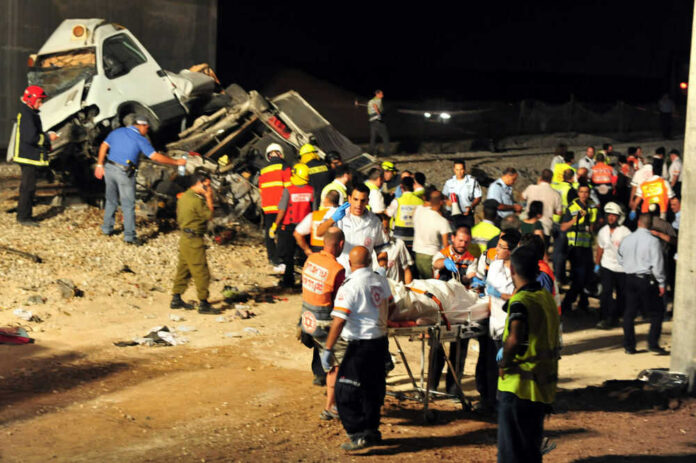 Emergency responders at the scene of a vehicle crash.