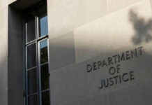 Foreign Prison Gang Tied To U.S. Murders Department of Justice building wall and window