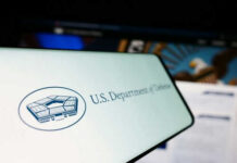 Epic Fury Ends — Now What? U.S. Department of Defense logo on a smartphone screen