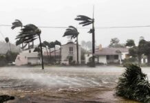 Lightning Blast Inches From Disaster Houses battered by hurricane winds and flooding